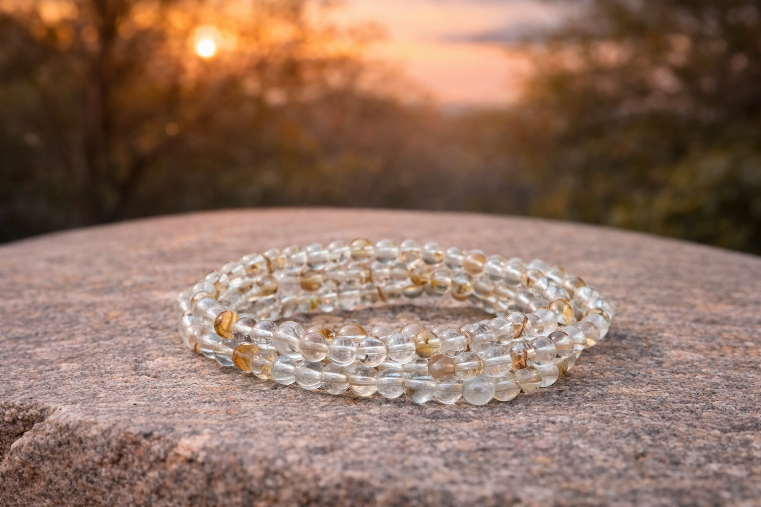 4mm natural golden topaz crystal stone energy bracelet featuring golden-yellow gemstones on a stretch cord.