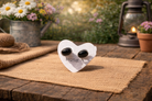 Natural stone Hypersthene oval sterling silver stud earrings with crystal energy, featuring a polished silver setting and unique stone pattern.