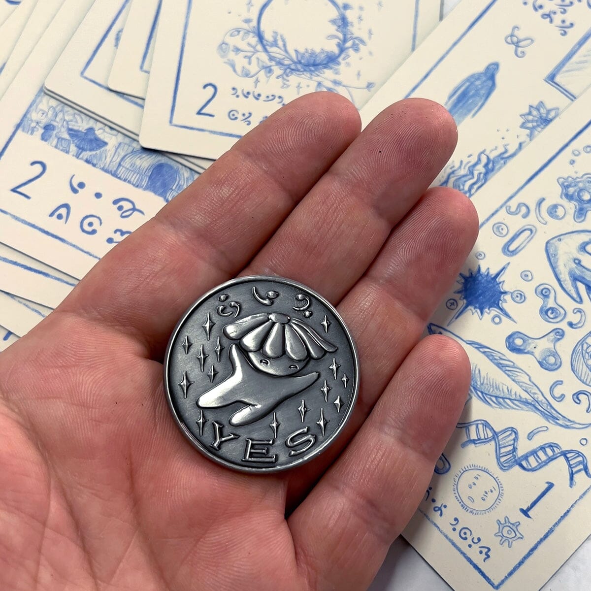 Prisma Visions Kuzo Yes/No coin featuring a distinctive design, used for decision-making or as a collectible coin.