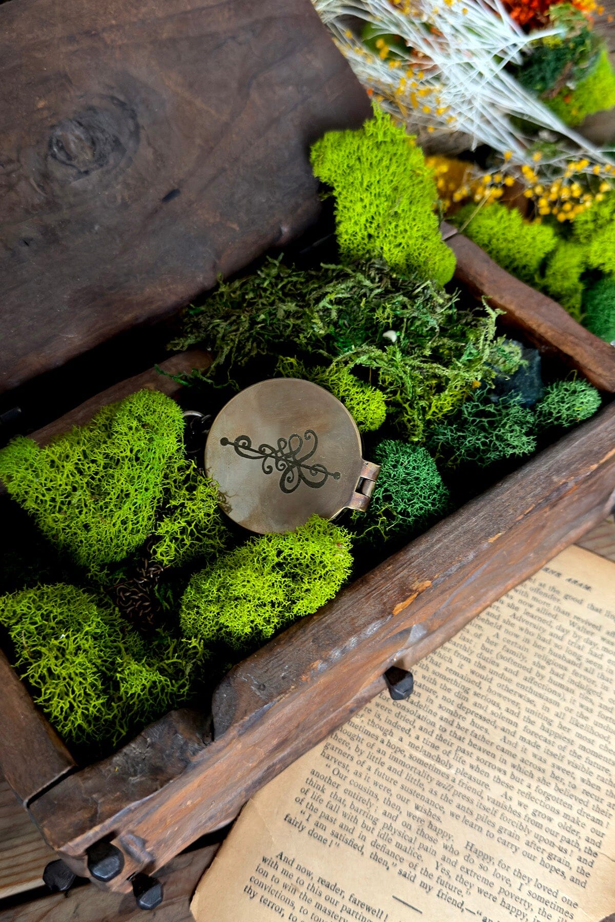 Prisma Visions Compass of Many Paths, a detailed metal compass with intricate design, set against a neutral background.