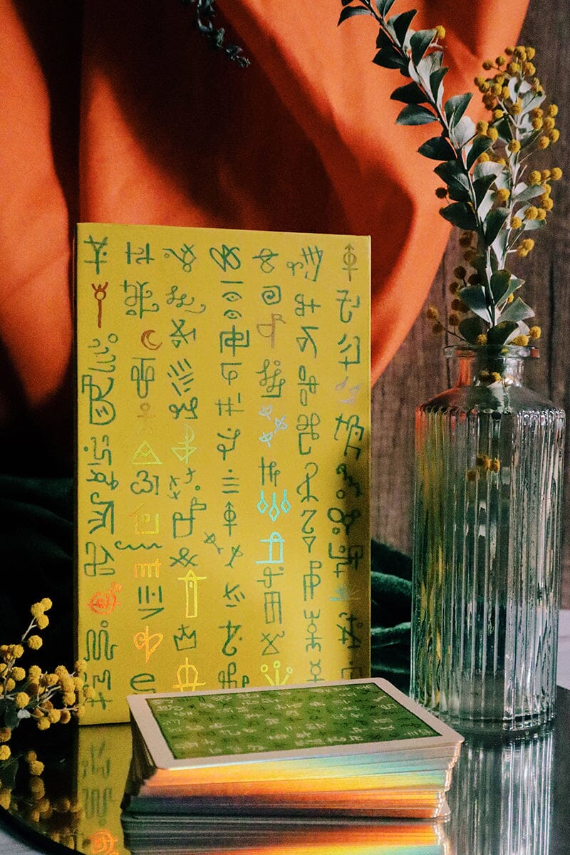 Green Glyphs Lenormand deck by Prisma Visions, featuring intricate green-themed card illustrations for divination.