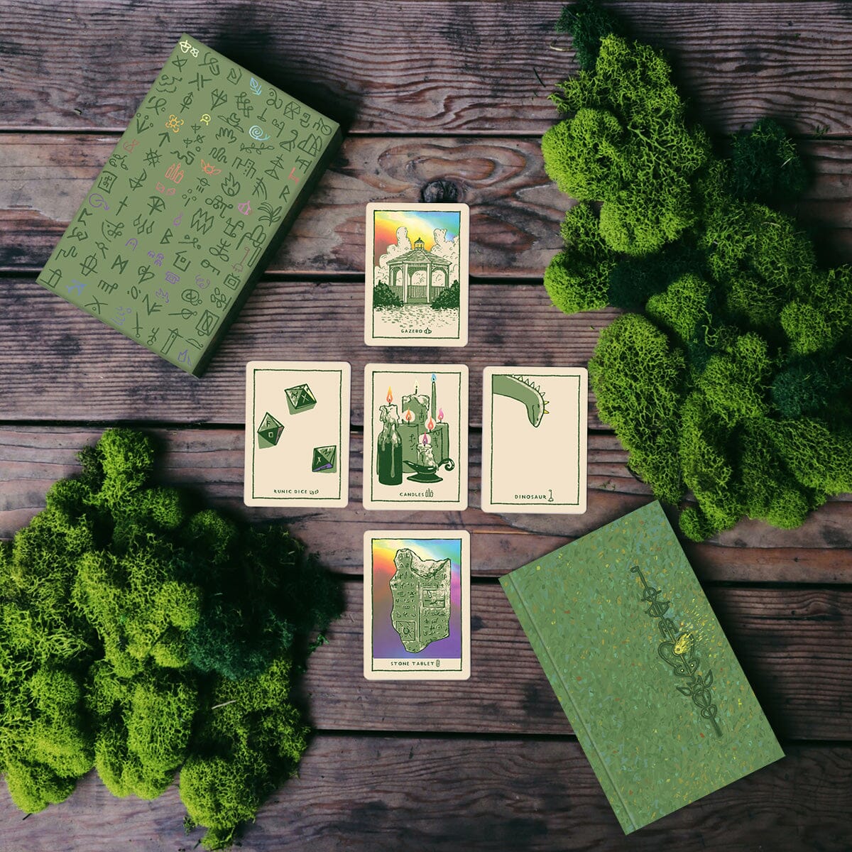 Green Glyphs Oracle deck by Prisma Visions featuring intricate green and gold card designs with mystical symbols.
