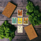 Green Glyphs Runes deck by Prisma Visions featuring intricate mystical rune illustrations on card backs.