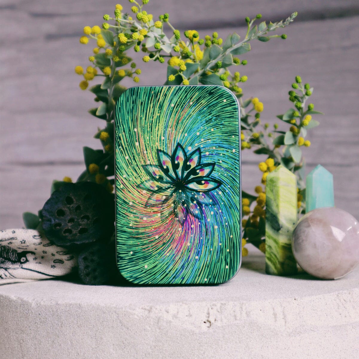 Little Cosma Visions tarot deck by Prisma Visions, featuring colorful, artistic card designs on the deck's front.