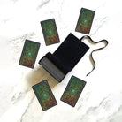 Prisma Visions Mirra Visions Satchel deck featuring colorful, artistic card illustrations in a modern deck design.