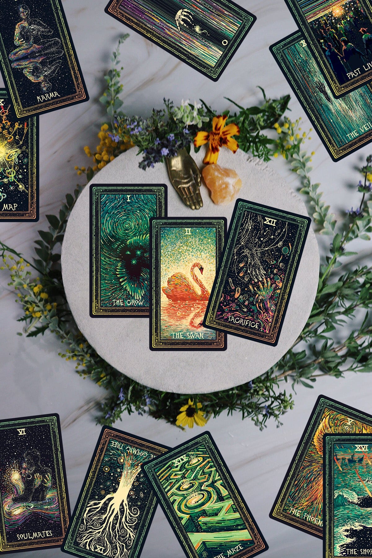 Cosma Visions Oracle deck by Prisma Visions, featuring colorful, artistic tarot cards laid out in a spread.