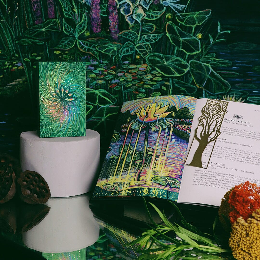 Prisma Visions Cosma Visions Oracle deck with colorful, detailed oracle cards laid out in a vibrant, mystical design.