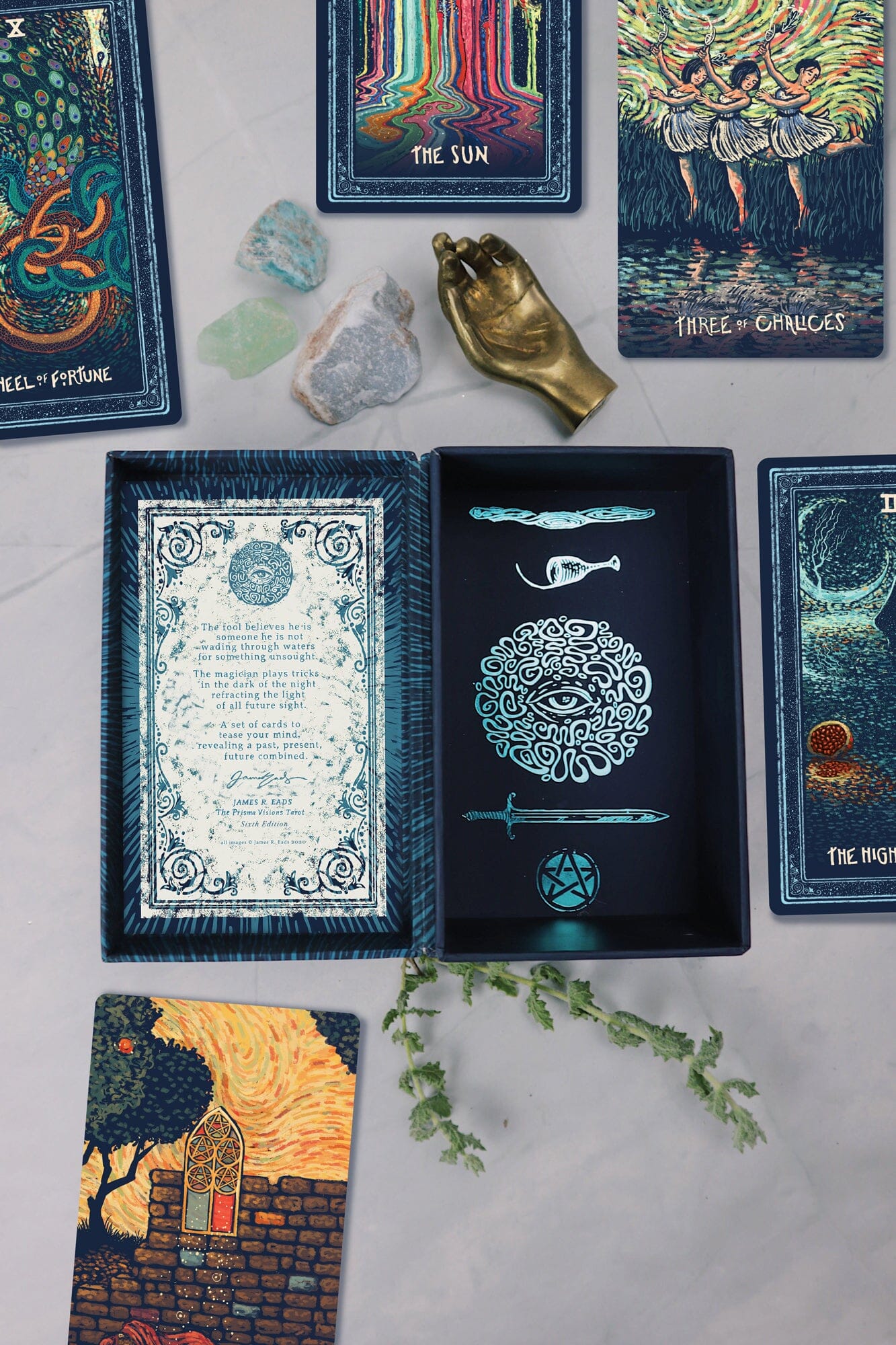 Prisma Visions Tarot deck, Seventh Edition, featuring colorful, intricate card illustrations for tarot reading and divination.