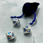 Cerulean Prisma Visions dice set featuring vibrant blue resin dice with intricate patterns and numbering for tabletop gaming.