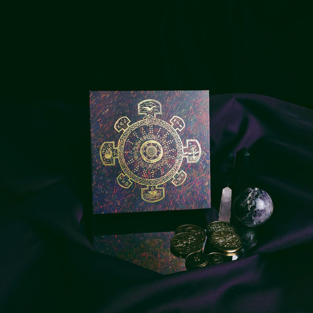 Set of 20 Prisma Visions Geomancy Coins with intricate symbols, used for divination and spiritual practices.