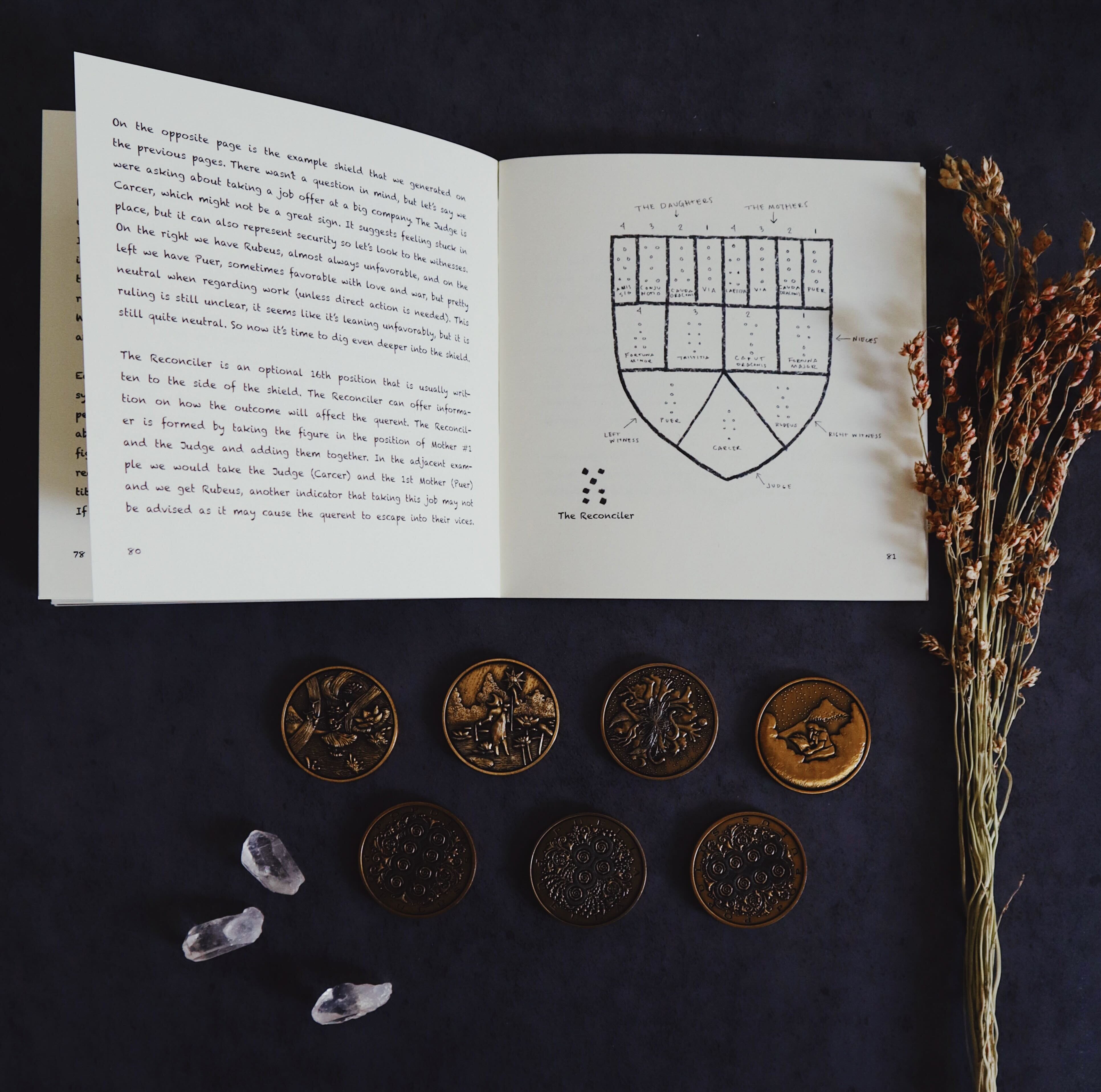 Set of 20 Prisma Visions Geomancy Coins featuring mystical symbols for divination and spiritual practices.