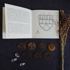 Set of 20 Prisma Visions Geomancy Coins featuring mystical symbols for divination and spiritual practices.