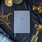 Cerulean Divination Diary journal by Prisma Visions with a blue cover, featuring mystical and artistic design elements.