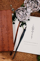 Green Glyphs Divination Diary journal by Prisma Visions with mystical glyph cover design and lined pages for daily reflections.