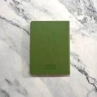 Prisma Visions Many Paths Divination Diary journal with illustrated cover featuring mystical symbols and a celestial design.