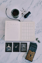 Prisma Visions Divination Diary journal with mystical cover design, featuring pages for daily reflections and tarot-inspired artwork.