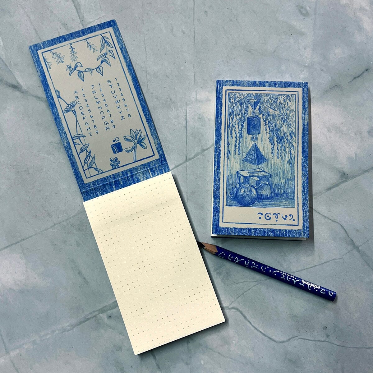 Cerulean Notepad by Prisma Visions with a soft blue cover and lined pages for writing and note-taking.