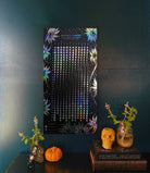 White print of the Moonflowers 2026 Lunar Calendar by Prisma Visions, featuring detailed lunar phases and celestial artwork.