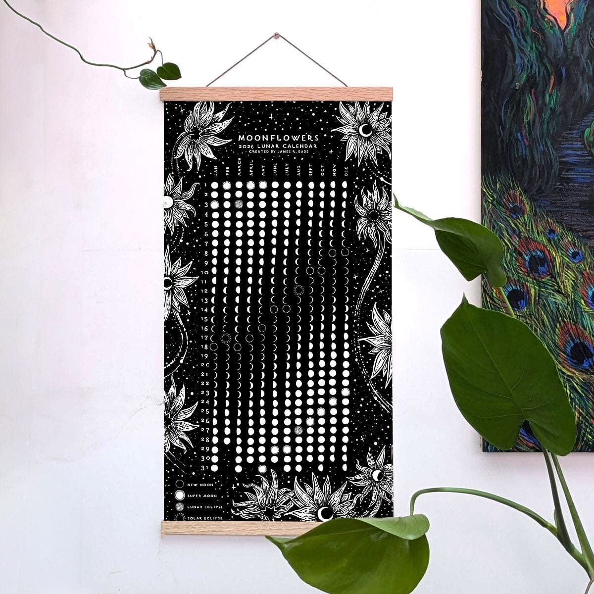 White print of the Moonflowers 2026 Lunar Calendar by Prisma Visions, featuring detailed lunar illustrations on paper.