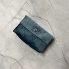 Cerulean Prisma Visions satchel showing a stylish blue leather bag with a top handle and adjustable shoulder strap.