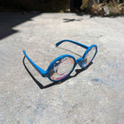 Cerulean spectacles by Prisma Visions featuring blue-tinted frames and clear lenses, stylish eyewear for everyday wear.