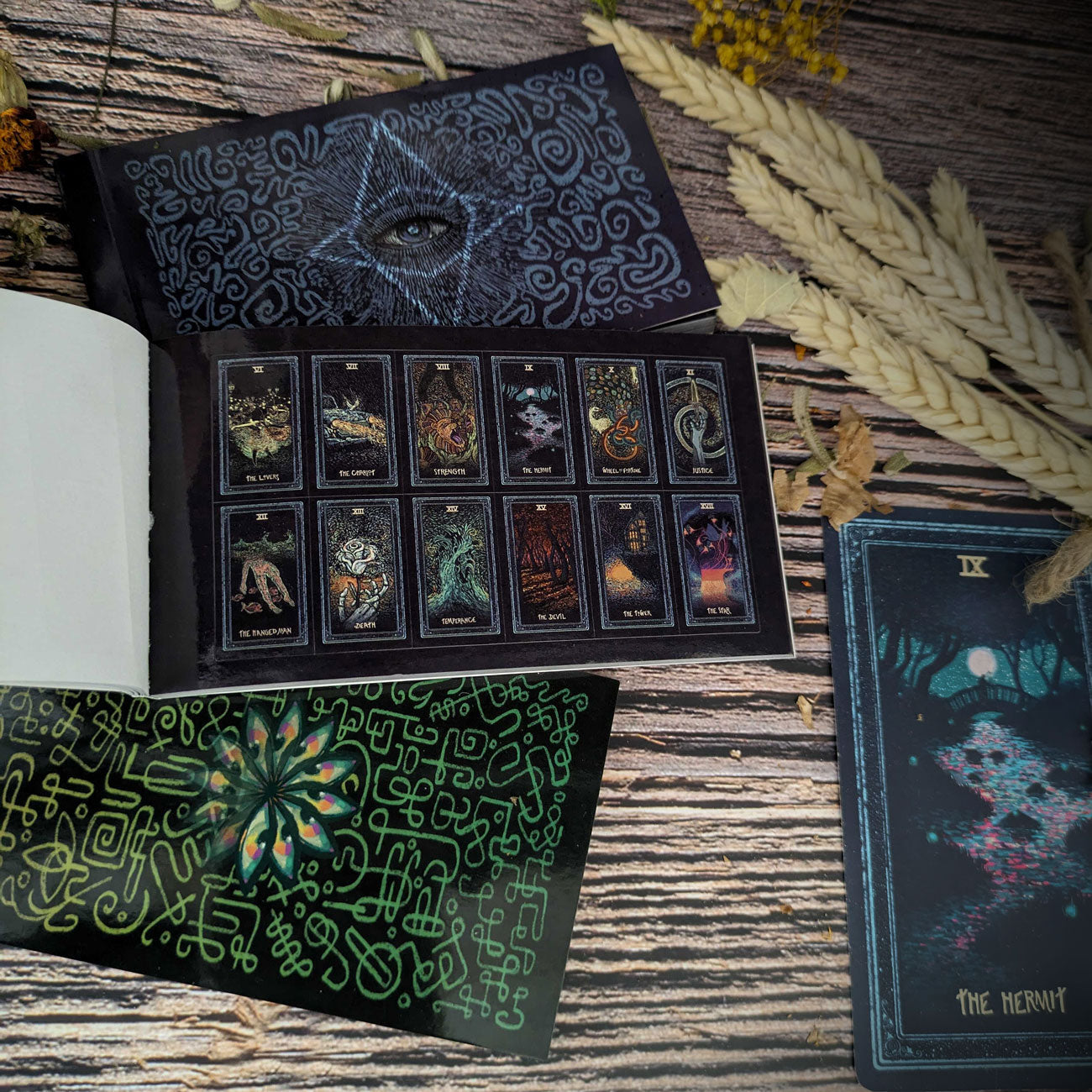 Prisma Visions Tarot sticker book featuring colorful, artistic tarot card designs on pages for decorating and collecting.