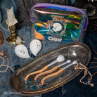 Casper the Friendly Ghost cosmetic bag with glow-in-the-dark face gems, from Profusion Cosmetics accessories collection.