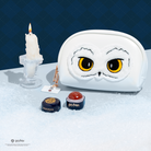 Harry Potter Hedwig makeup bag by Profusion Cosmetics, soft accessories case featuring Hedwig owl design from Harry Potter Holiday collection