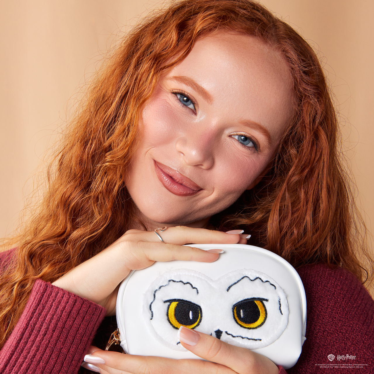Harry Potter Hedwig makeup bag by Profusion Cosmetics, festive holiday-themed accessories with detailed owl design.