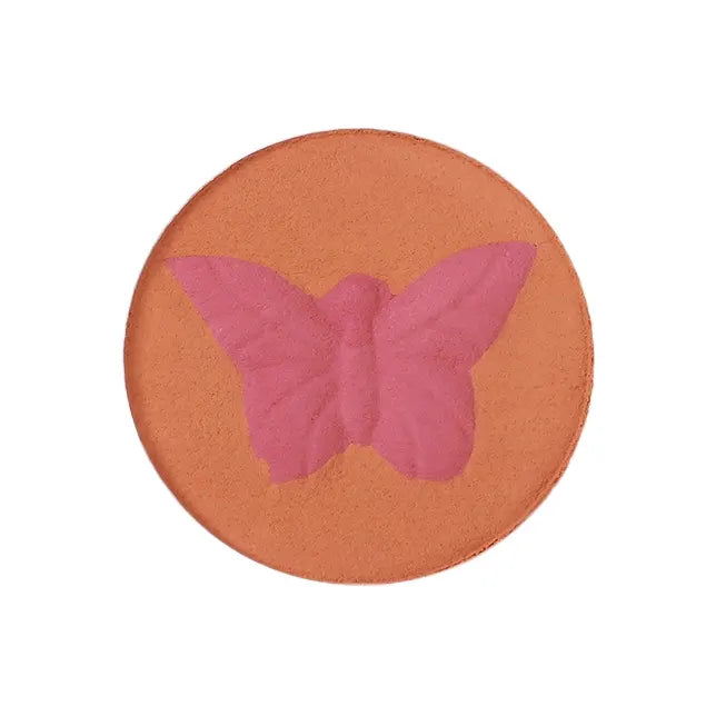 Profusion Cosmetics Empowered Butterfly Social Butterfly Mousse Blush in a vibrant pink shade, showcasing the smooth, creamy blush formula.