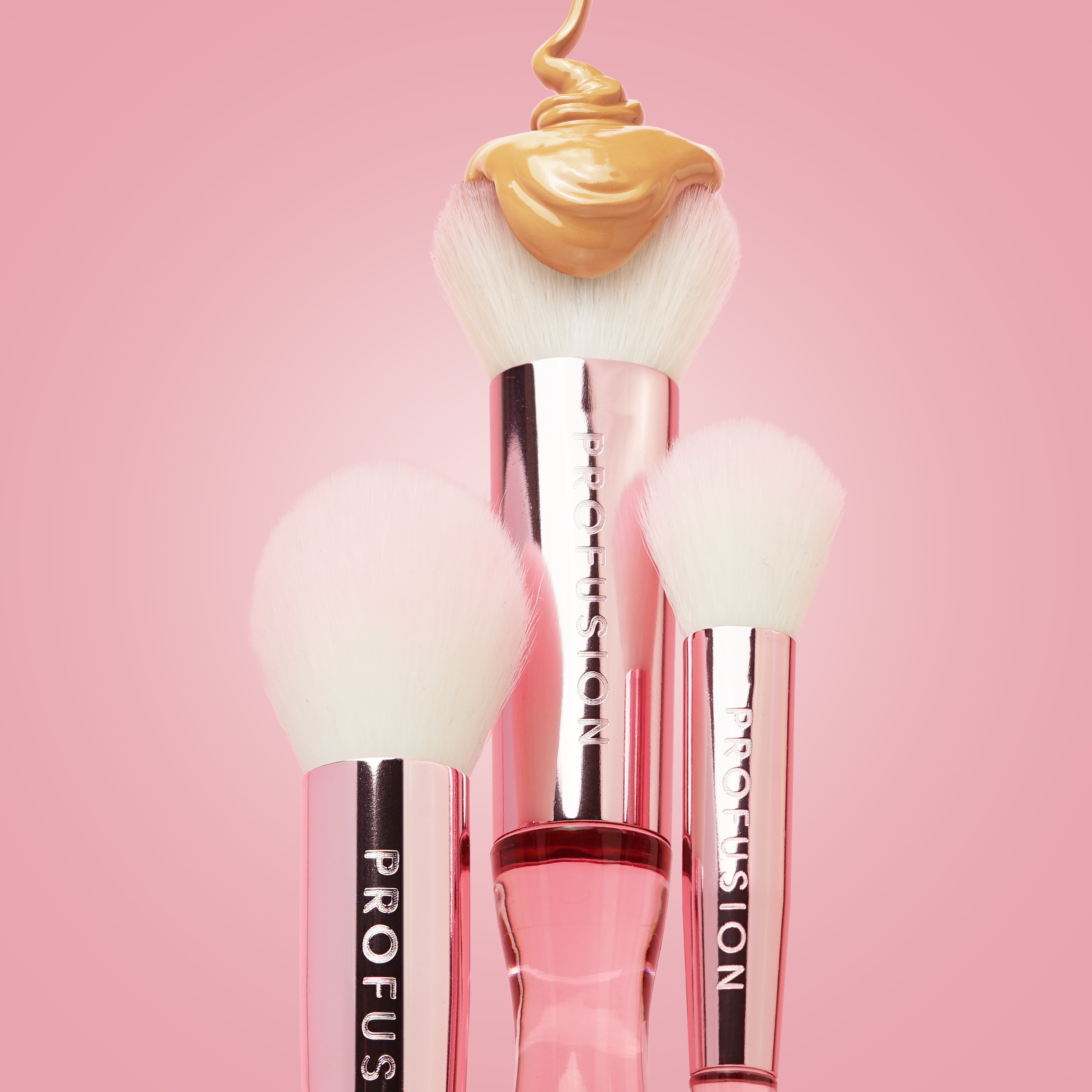 Profusion Cosmetics Face Essentials 3-piece face brush set with soft, tapered brushes for applying makeup smoothly and evenly.