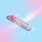 Profusion Cosmetics Dewy Glow Plumping Water Gloss in clear, shiny finish, showing smooth, glossy lips with a hydrated look.