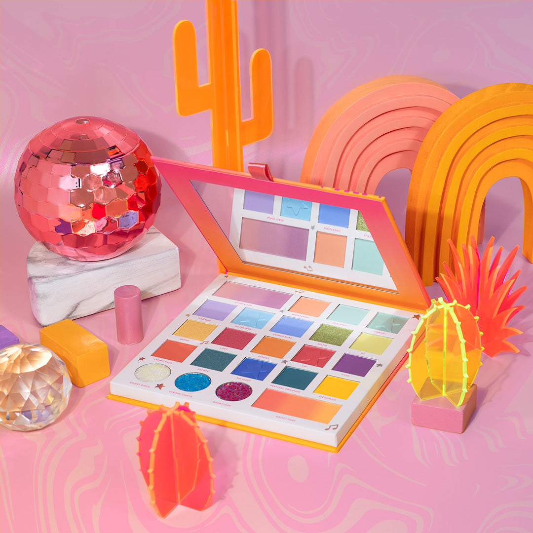 Profusion Cosmetics It's a Vibe Mainstage 23-Shade Palette with vibrant eyeshadows in various colors displayed open.