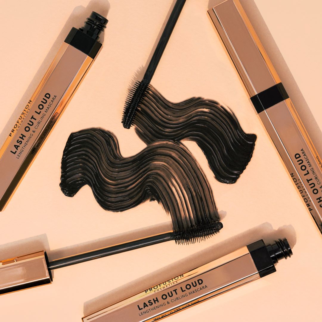 Profusion Cosmetics Lash Out Loud lengthening and curling mascara in black, showing the mascara wand and brush application.