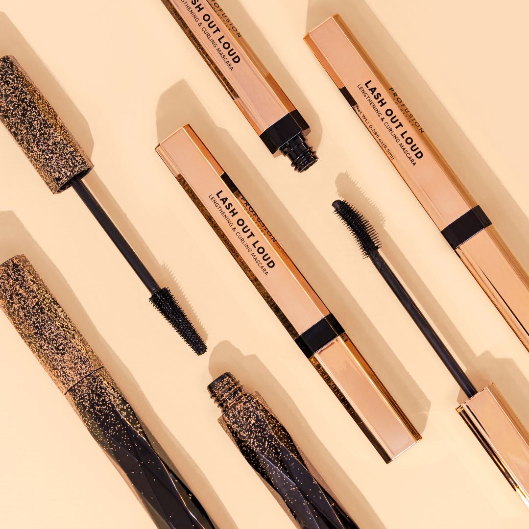 Profusion Cosmetics Lash Out Loud lengthening and curling mascara in black, showing the mascara wand and brush application.