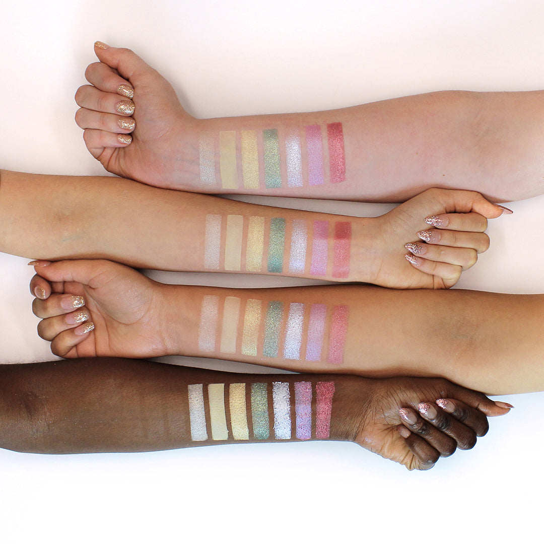 Wanderlust eyeshadow palette by Profusion Cosmetics featuring colorful shades in a sleek compact for creative eye looks.
