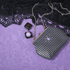 Profusion Cosmetics Gothic Beauty cosmetic bag with eye makeup and lip balm set, featuring dark, stylish design and multiple eye products.