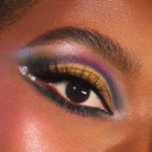 Profusion Cosmetics Peanuts Halloween Trick or Treat 31-shade eye palette with colorful eyeshadows in themed packaging.