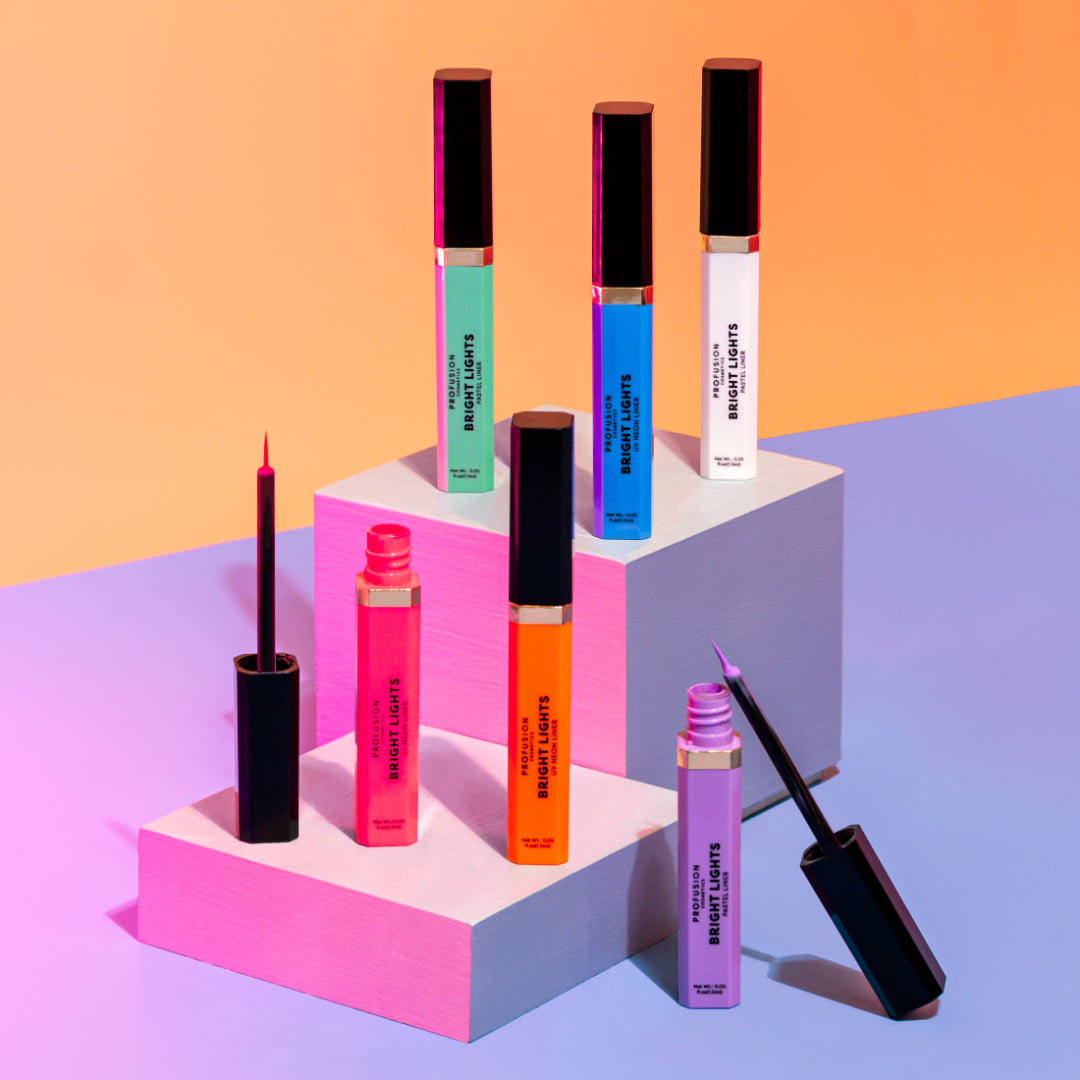Profusion Cosmetics Bright Lights neon and pastel graphic liners for eyes, featuring vibrant blue shades with bold, colorful designs.