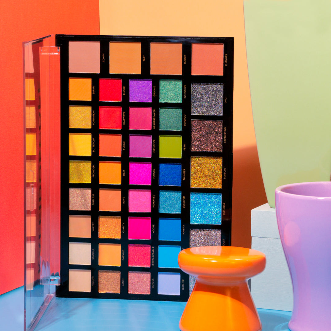 Profusion Cosmetics 42-shade eyeshadow palette with a variety of vibrant and neutral colors for versatile eye makeup looks.