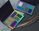 Profusion Cosmetics Enchanted Forest Divine Palette eyeshadow palette with vibrant green, brown, and earthy tones for eye makeup.