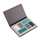 Profusion Cosmetics Enchanted Forest Nightshade eyeshadow palette with various shades of green, purple, and earthy tones.