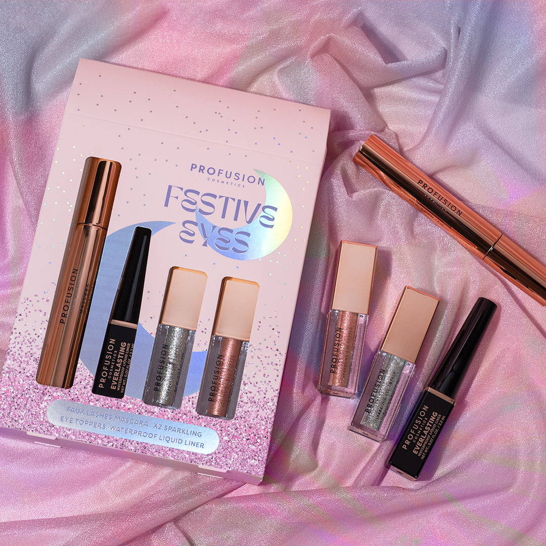 Profusion Cosmetics Festive Eyes 4-piece eye set with colorful eyeshadows and applicators for a vibrant, holiday-ready look.