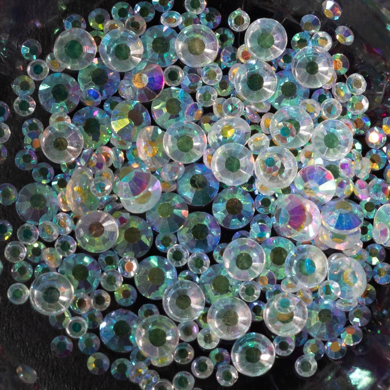 Profusion Cosmetics Metachrome Glitter Glitch Holo Brow Gel and Gems for eye makeup with shimmering, holographic effects.