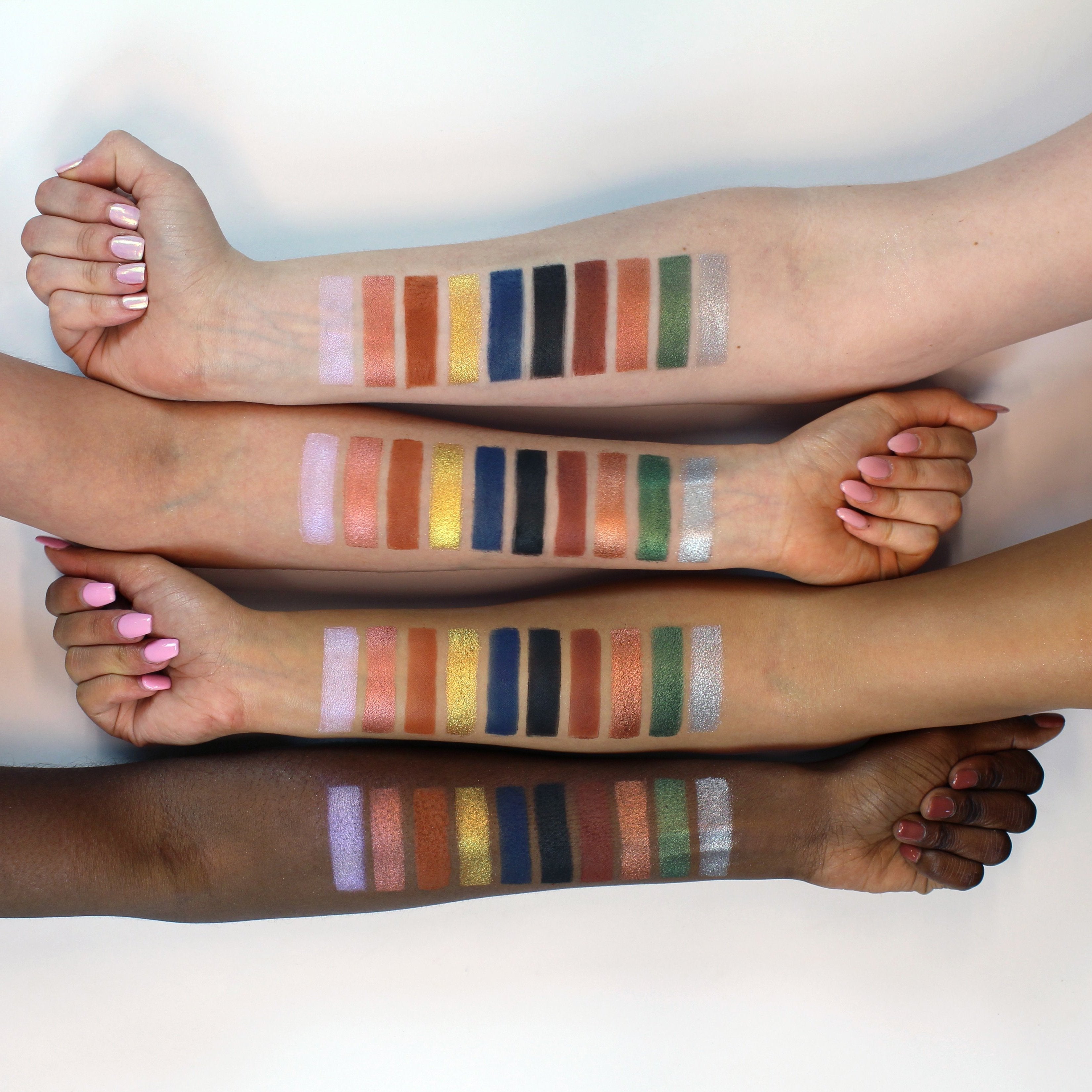 Profusion Cosmetics Royals Eyeshadow Palette with vibrant royal blue, gold, and neutral shades for versatile eye looks.