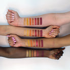 Profusion Cosmetics Siennas eyeshadow palette with warm-toned shades and eye makeup swatches on skin.