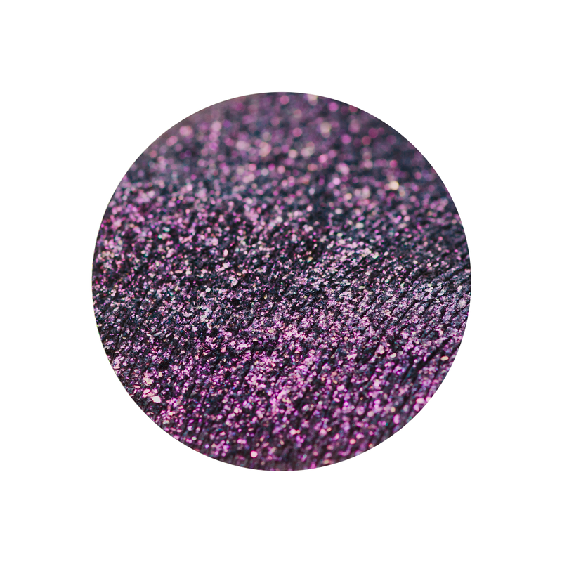 Profusion Cosmetics Sea Witch Pigments eyeshadow with vibrant, shimmery green and blue shades in a close-up image.