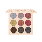 Profusion Cosmetics 20th Anniversary pressed glitter eyeshadow palette with gold-toned shades and multiple glitter finishes.