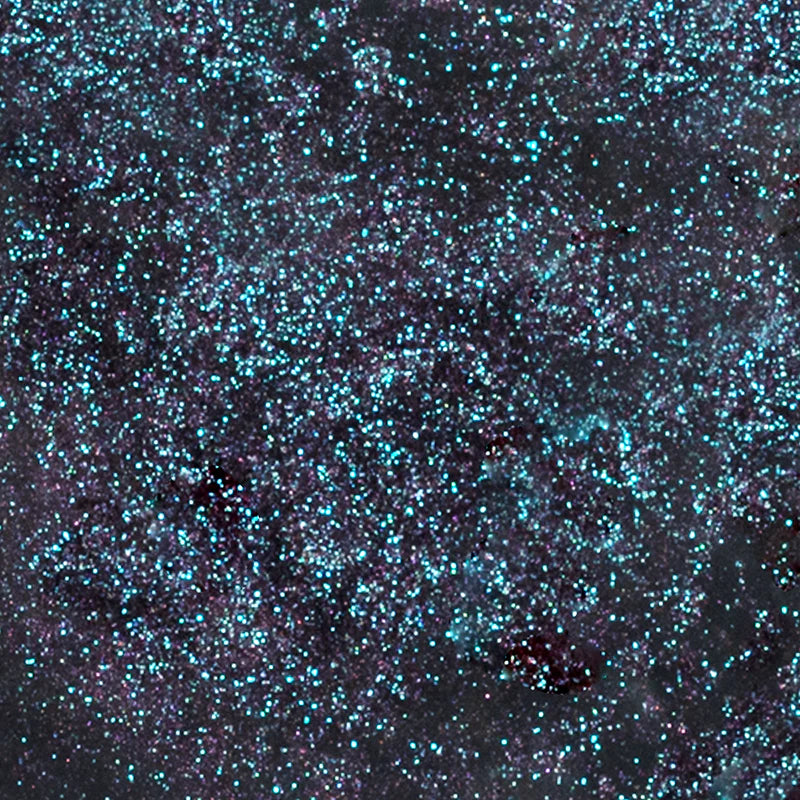 Profusion Cosmetics Enchanted Forest Dragon Duochrome Mineral Eye Pigment showing iridescent green and purple shades on the eyes