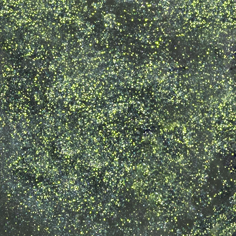 Profusion Cosmetics Enchanted Forest Dragon Duochrome mineral eyeshadow with shimmering green and purple hues in a sleek palette.